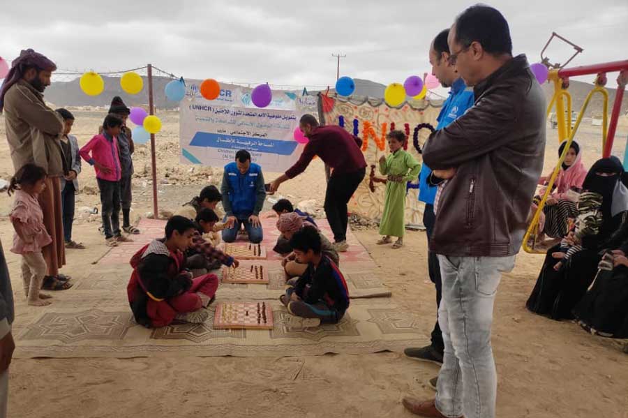A UNHCR team visits the community center and child friendly space