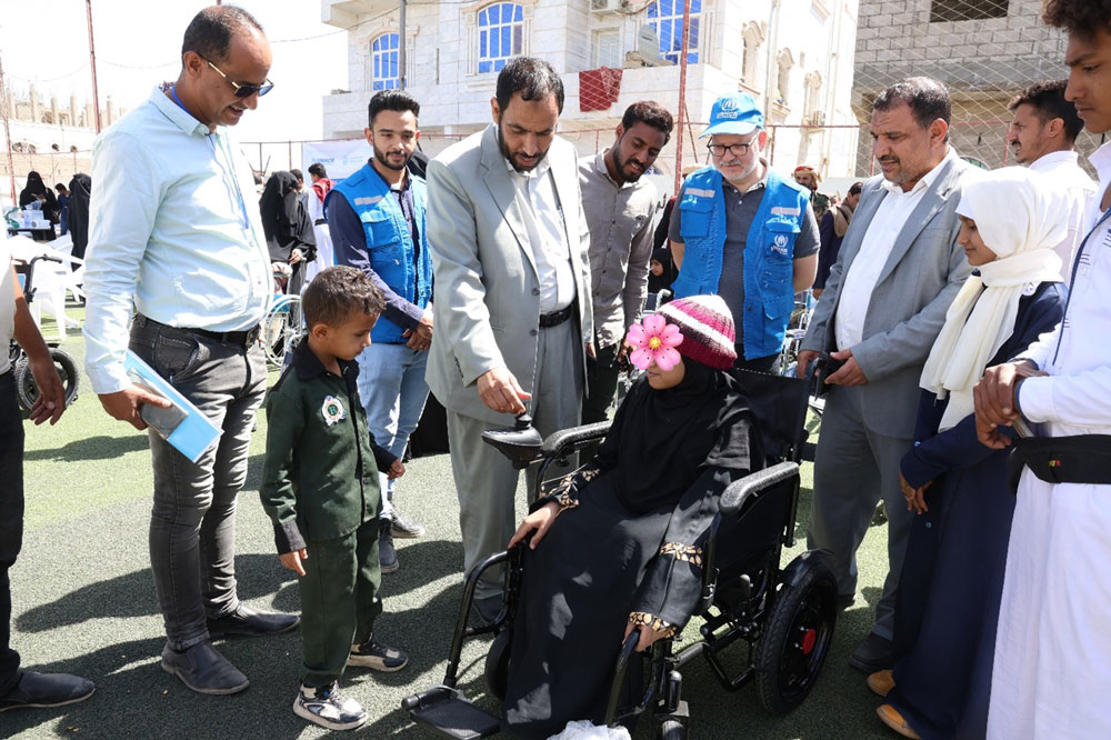 People with special needs receive electric and wheelchairs 