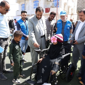 People with special needs receive electric and wheelchairs 