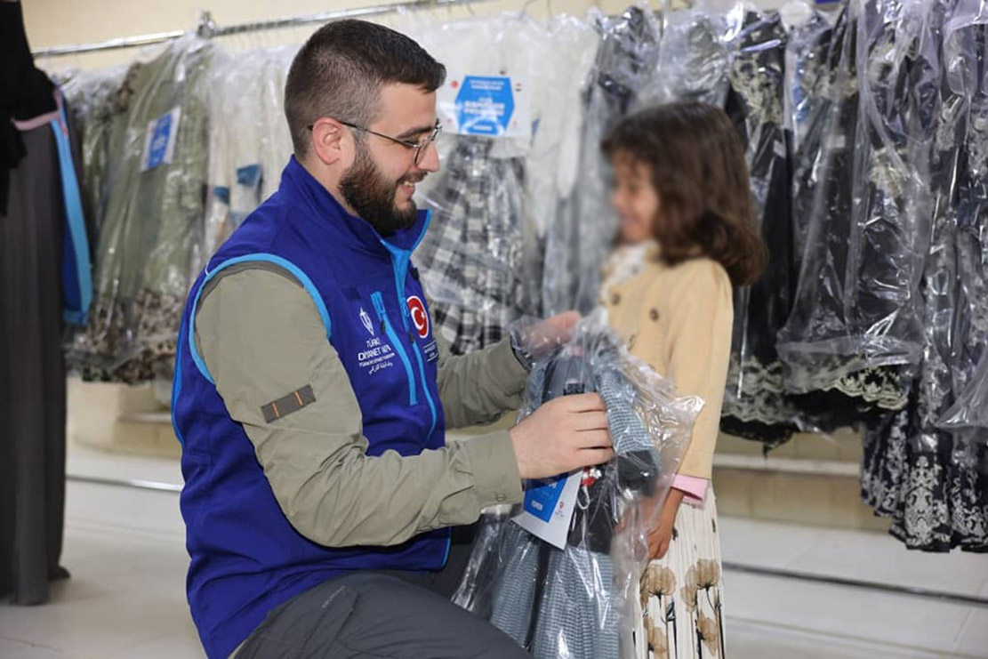 Distribution of 500 food baskets and clothing to 100 children