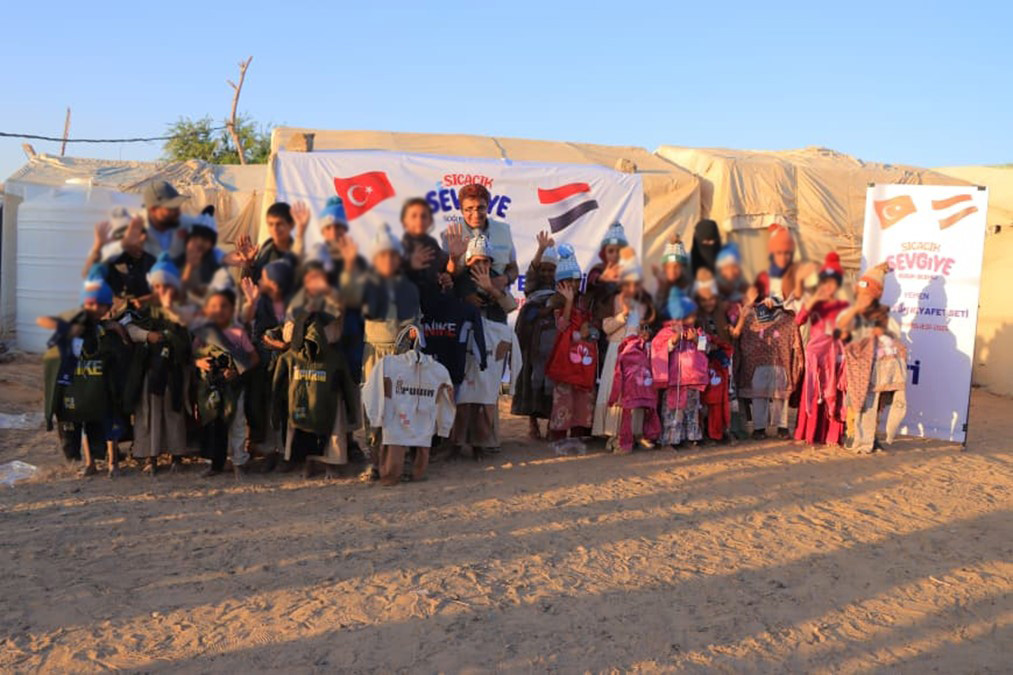 Winter clothing brings warmth to 500 orphans in camps